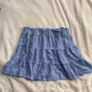 Blue circle skirt with white flowers